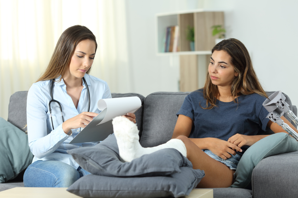 Injured woman consultation by the doctor.