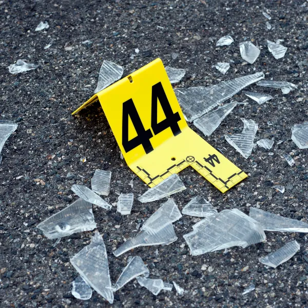 An image of investigators assessing the accident scene to determine liability.