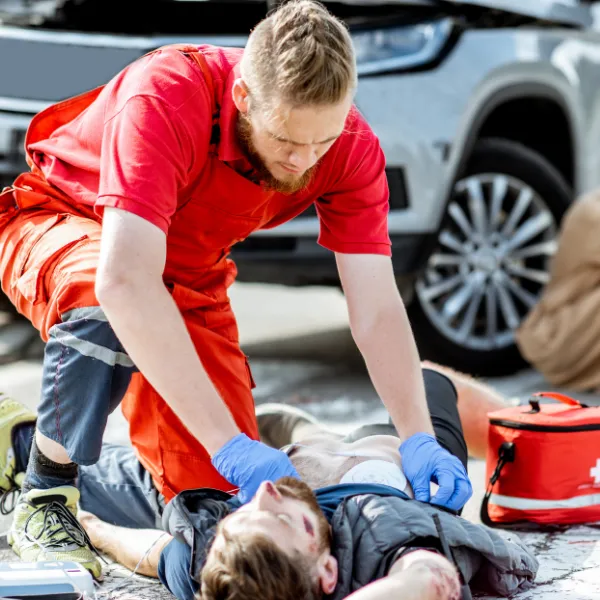 An image of medical professionals treating severe injuries from a truck accident.