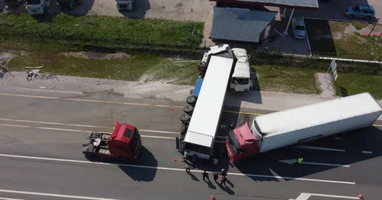 An image showing a vehicle owned by a trucking company getting into an accident.