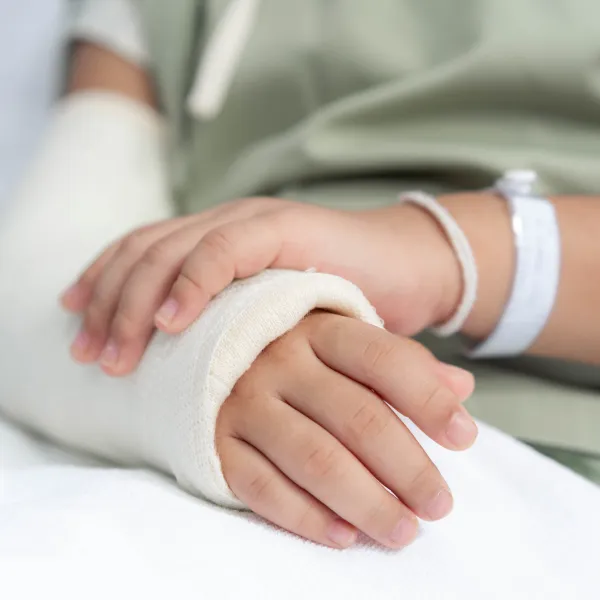Image of a person injured after a truck accident on the highway.